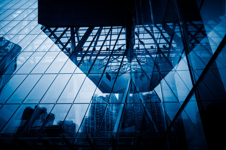 buildings reflected at the glass wall,blue toned,shanghai image.のeditorial素材