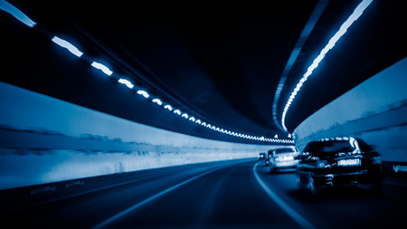 car driving through tunnelの写真素材