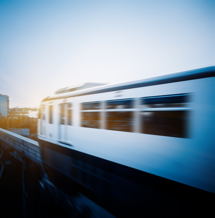 light rail moving on railway in chongqingの写真素材