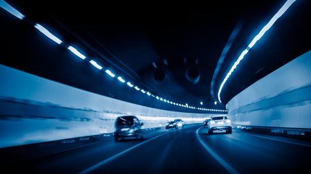 car driving through tunnelの写真素材