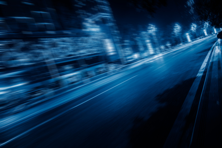 blurred traffic in the daowntown center,chongqing china,blue toned image.の写真素材
