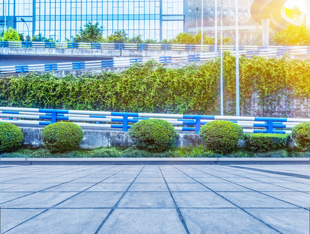 clean road with building background,chongqing china.の写真素材