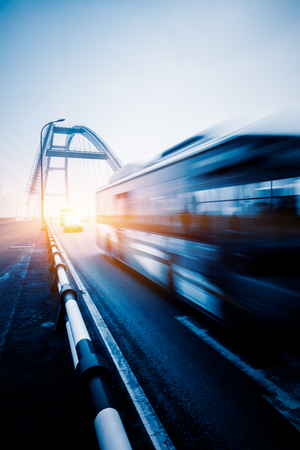 motion blurred traffic on the yangtse river bridge,chongqing china.の写真素材