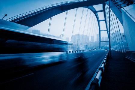 motion blurred traffic on bridge,chongqing china.の写真素材