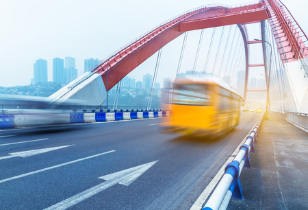 motion blurred traffic on bridge,chongqing china.の写真素材