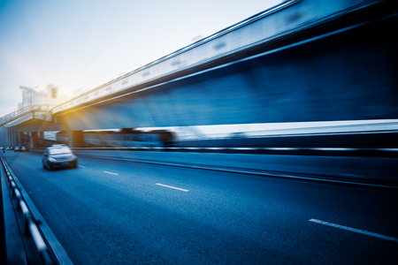 motion blurred traffic on bridge,chongqing china.の写真素材