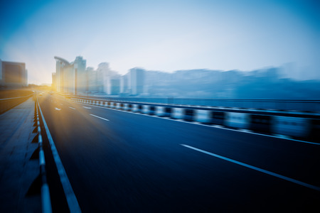 motion blurred traffic on bridge,chongqing china.の写真素材