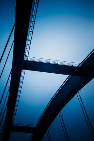detail of yangtse river bridge structure,chongqing china,blue toned image.の写真素材