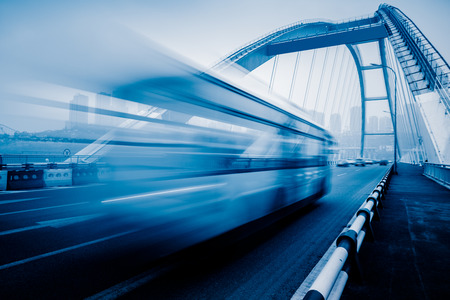 motion blurred traffic on bridge,chongqing china.の写真素材