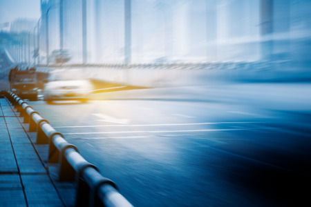 motion blurred traffic on bridge,chongqing china.の写真素材