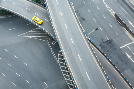 aerial view of car driving on chongqing caiyuanba overpassの写真素材