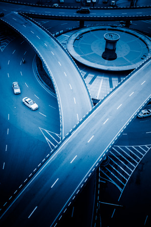 aerial view of traffic on chongqing overpass on a sunny day,china,blue toned image.の写真素材
