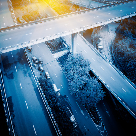 aerial view of traffic on chongqing overpass on a sunny day,china,blue toned image.の写真素材