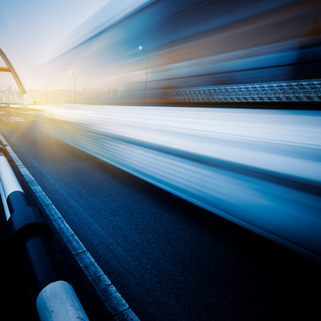 motion blurred traffic on bridge,chongqing china.の写真素材