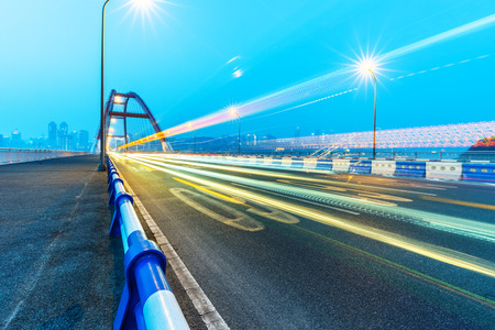 traffic trails on bridge,chongqing china.の写真素材