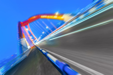 traffic trails at caiyuanba yangtze river bridge,chongqing china.の写真素材