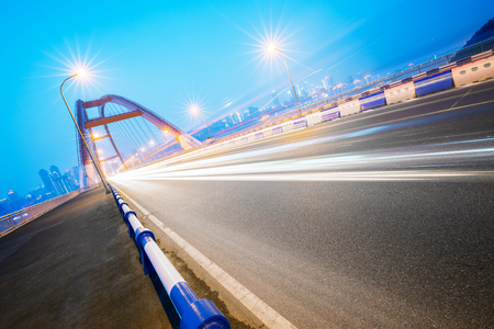 traffic trails on bridge,chongqing china.の写真素材