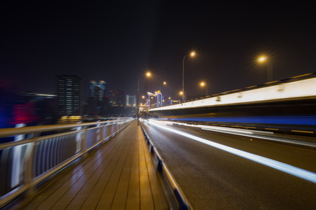 traffic trails,yangtse river bridge,chongqing china.の写真素材