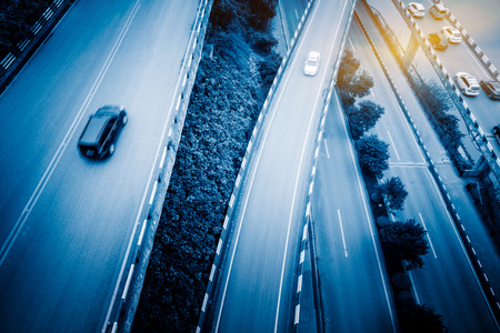 aerial view of traffic on chongqing overpass on a sunny day,china,blue toned image.の写真素材