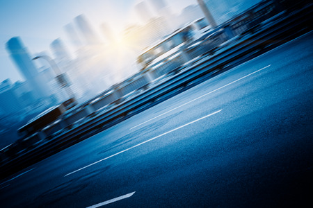 traffic on highway,with city background,chongqingの写真素材