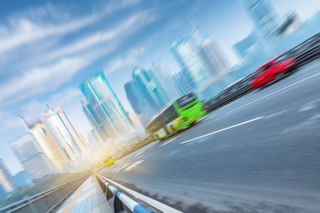 traffic on highway,with city background,chongqingの写真素材