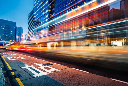 car trails in the downtown street,hongkong china.の写真素材