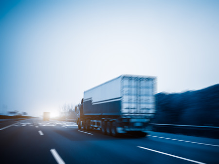 freight car driving on the highway,motion blurredの写真素材