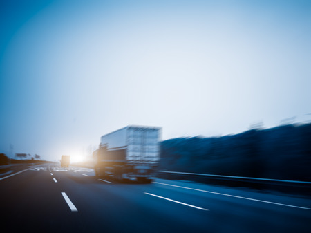 freight car driving on the highway,motion blurredの写真素材