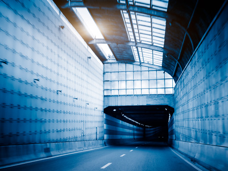 traffic in the tunnel, shanghai ,china. blue toned.の写真素材