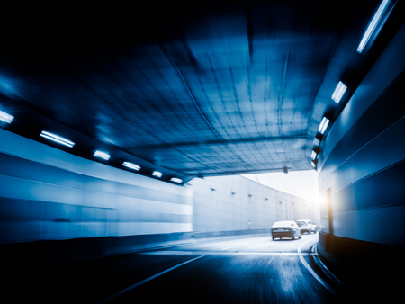 traffic in the tunnel, shanghai ,china. blue toned.の写真素材