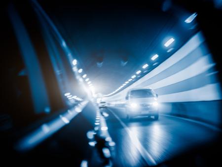 traffic in the tunnel, shanghai ,china. blue toned.の写真素材