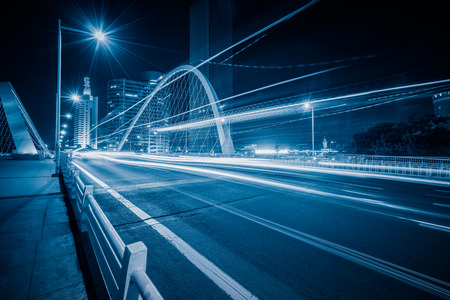 car trails at bridge,tianjin city,china.の写真素材