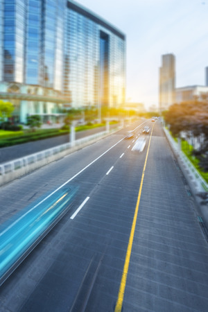 motion blurred traffic with modern buildings backgroundの写真素材