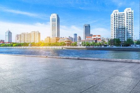 empty floor and city skyline under blue sky,tianjin china.の写真素材