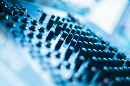 close-up view of professional sound mixer,blue toned,still life.の写真素材