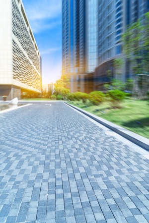 empty cement floor and modern buildings,tianjin china.の写真素材