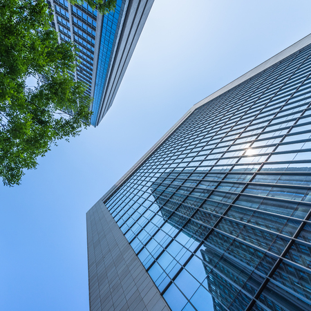 modern office building with green leavesの写真素材