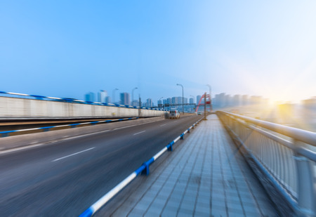 motion blurred traffic on bridge,chongqing china.の写真素材