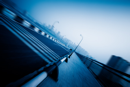 motion blurred traffic on bridge,chongqing china.の写真素材