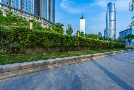empty cement floor and modern buildings,tianjin china.の写真素材