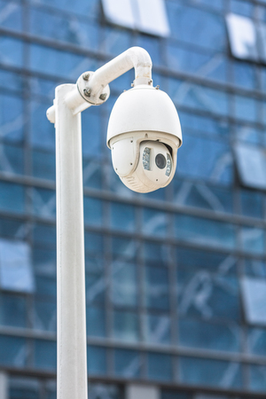 security camera in front of the office buildingの写真素材