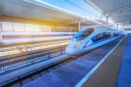 high-speed train at the railway station,motion blurred,tianjin china. high-speed train at the railway station,motion blurred,tianjin china.