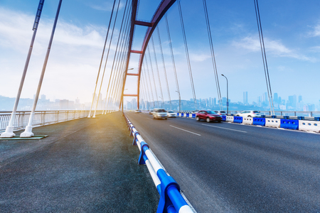 motion blurred traffic on bridge,chongqing china.の写真素材
