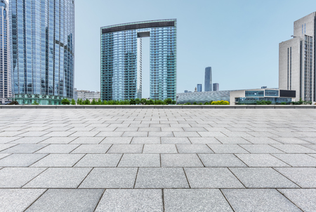 Empty brick floor with modern building in Shanghaiのeditorial素材