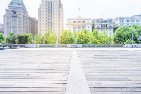 empty wooden floor with city skyline backgroundの写真素材