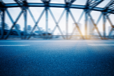 City road with moving traffic,shanghai china.の写真素材
