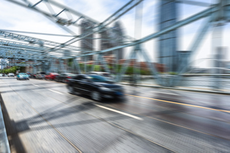 traffic motion blurred at steel bridgeの写真素材