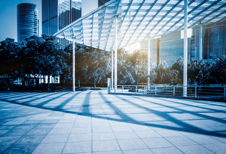 Empty brick floor with modern buildingの写真素材