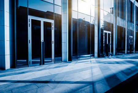 Empty brick floor with modern building wall,china.のeditorial素材