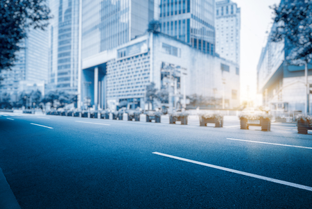 clean asphalt road with city skyline background,china.のeditorial素材